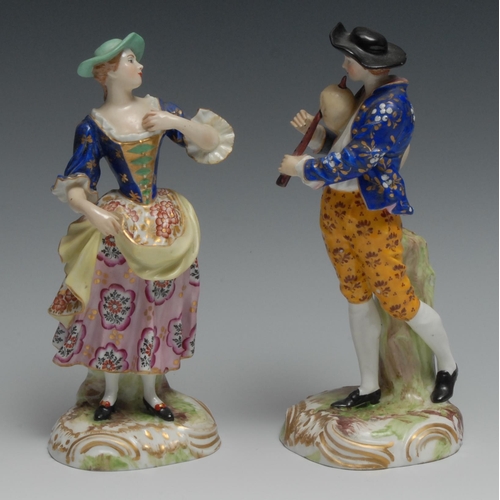 531A - A pair of late 19th century Continental Derby type figures, Bagpiper and companion, 22cm high, bears... 