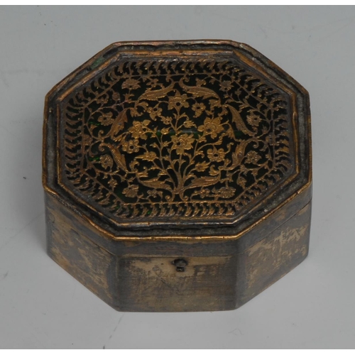 816A - A 19th century silvered brass octagonal snuff box, the hinged cover applied in green champlevé ename... 