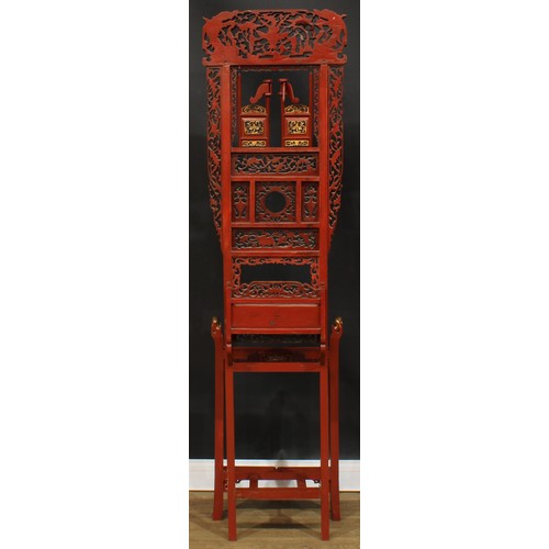 1640 - A Chinese parcel-gilt imitation cinnabar lacquer hall stand, shaped pediment pierced and carved with... 