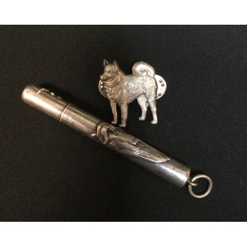 3310 - A silver coloured metal retractable pencil holder, cast with a Greyhounds head, 9.3cm long;  Kernart... 