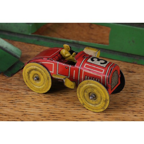 2156 - A Distler/EssDee (Johann Distler, Germany) novelty tinplate 'Over The Top' toy, comprising a miniatu... 