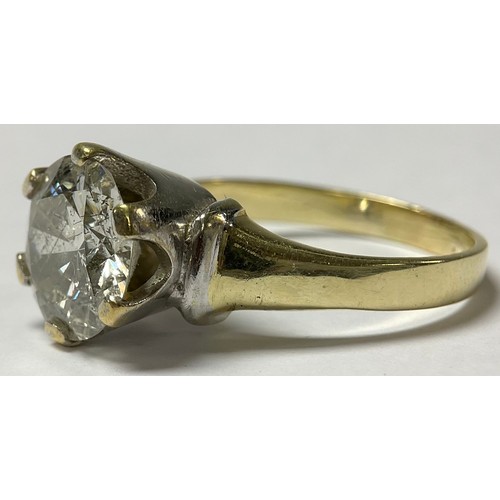 345 - A diamond solitaire ring, large round old brilliant cut diamond, measuring approx 10.56mm x 5.62mm, ... 