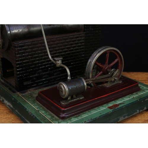 2222 - An early 20th century live steam horizontal stationary steam engine, fitted with a single cylinder a... 