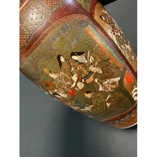 24 - A Japanese Satsuma pottery Meiji vase, intricately decorated with traditional figure panels, unmarke... 