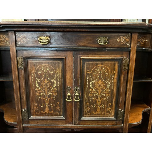 33 - A Victorian Rosewood chiffonier by James Shoolbred and Company, 206cm tall x 122cm wide x 39cm deep,... 