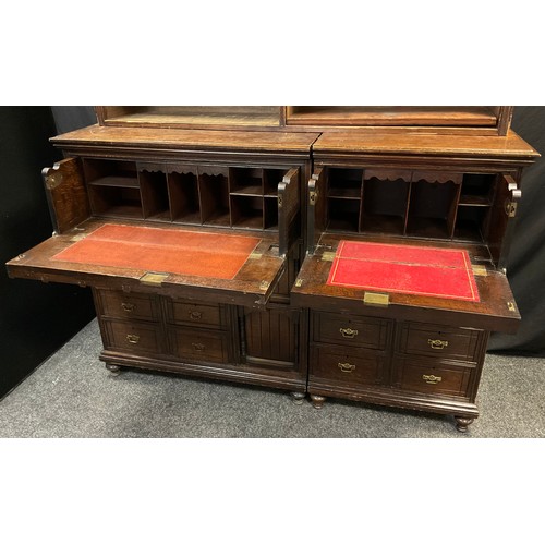 50 - A Victorian oak Secretaire bookcase cabinet, three tier bookcase top, with moulded cornice, over a b... 