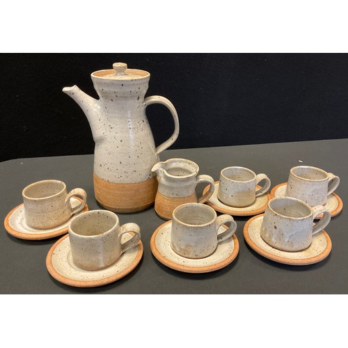 65 - A Winslow studio pottery coffee set, for six, mottled in tones of grey and brown, impressed marks