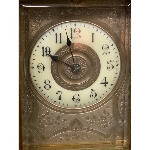 69 - A 19th century French bronze, brass and gilt metal repeating carriage clock, gilt cream dial, Arabic... 