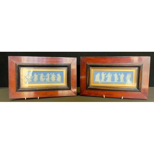 70 - A pair of 19th century Wedgwood blue Jasper ware plaques, The Muses and Dancing Hours, typically in ... 