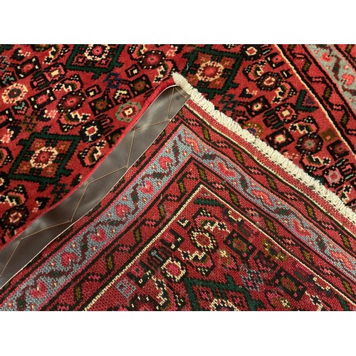 105 - A North-west Persian Malayer runner carpet, 286cm x 77cm.