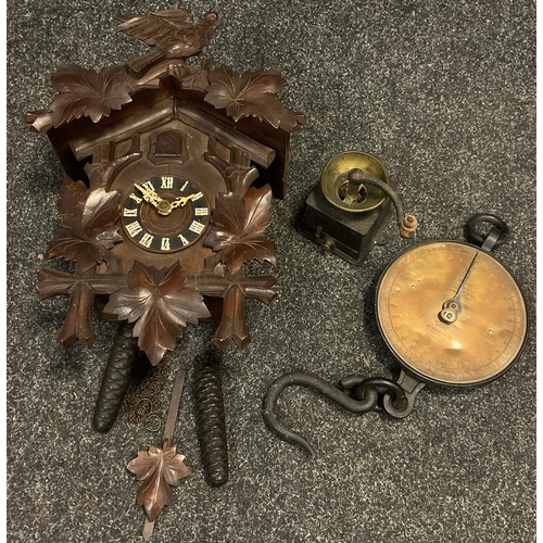 139 - An early 20th century cuckoo clock, Roman numerals, 45cm high'  a set No.20 Salter spring balance sc... 