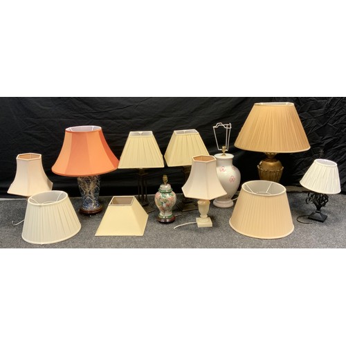 144 - A pair of bronzed metal table lamps, tapering shades;  others alabaster etc assorted sizes (10)