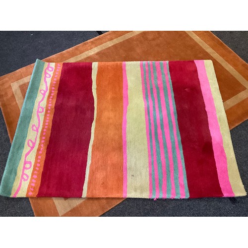 168 - A modern design woollen rug / carpet, with alternating bands in red, orange green and cream, 180cm x... 