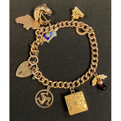 457 - A 9ct gold charm bracelet, suspending eight charms, Galleon, box, shield etc, 30.5g gross