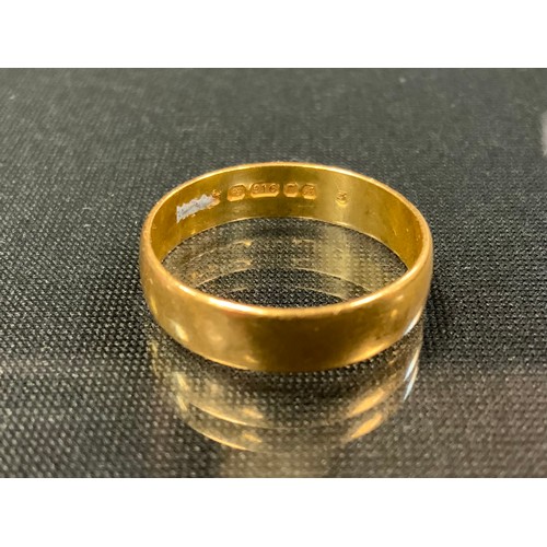 479 - A 22ct gold wedding band, size O, stamped 916, London 1975, 3.6g