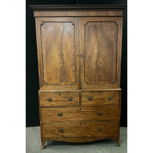 263 - A 19th century mahogany linen press, dentil cornice, flame mahogany box wood inlaid doors, with conv... 