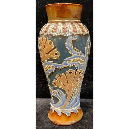 35 - A Doulton Lambeth salt glazed stoneware slender inverted baluster vase, decorated by Eliza Simmance,... 