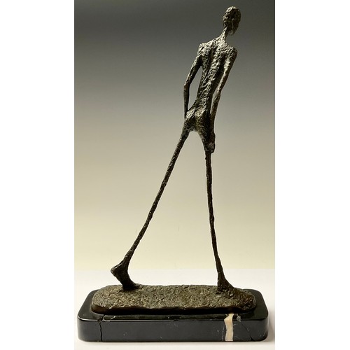 78 - A contemporary bronze sculpture, after Giacometti, Walking Man, shaped rectangular marble base, 45cm... 