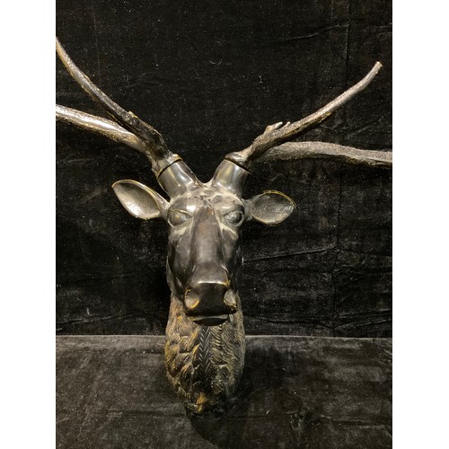 89 - Interior Decoration - a cast metal wall mask, of a stag, approx. 125cm wide x 94cm high