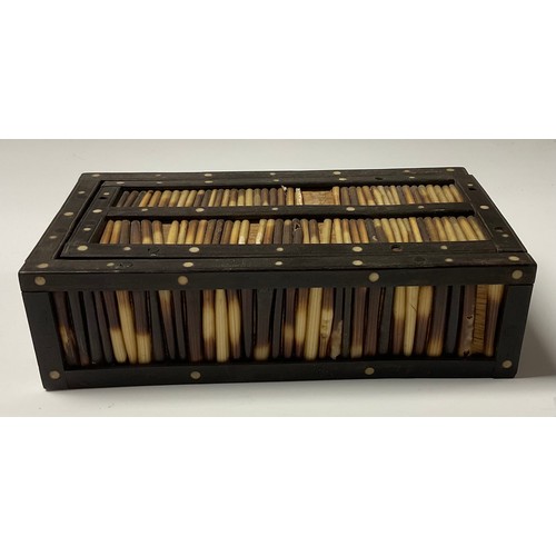 98 - A mid-20th century, Anglo-Indian, porcupine quill box, sliding cover, 17cm long