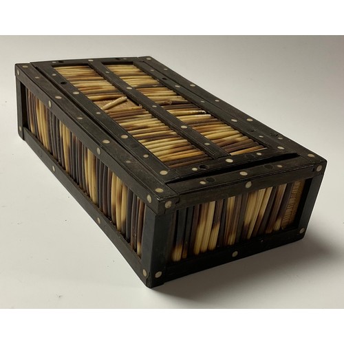 98 - A mid-20th century, Anglo-Indian, porcupine quill box, sliding cover, 17cm long