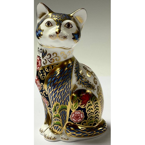 133 - A Royal Crown Derby paperweight, Fireside Cat, The Yorkshire Rose Collection, Peter Jones of Wakefie... 