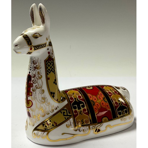 134 - A Royal Crown Derby paperweight, Llama, Collector's Guild exclusive, gold stopper, boxed