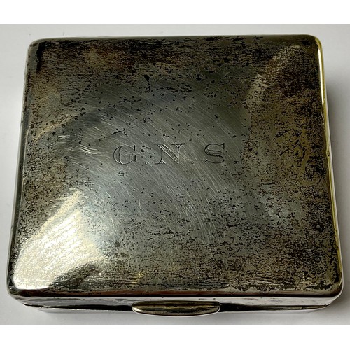 254 - An early 20th century silver rounded rectangular cigarette box, hinged cover, cedar lined, monogramm... 