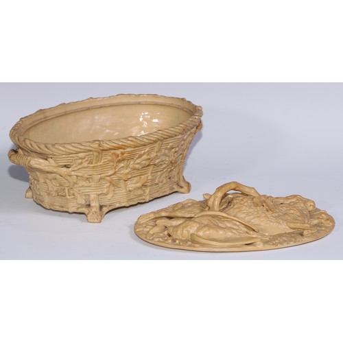 284 - A 19th century drabware oval game pie dish and cover, as a basket of game, 34cm wide, c.1850