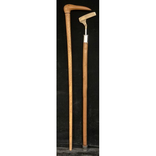 337 - A Pitcairn Island walking cane, the handle carved as the stylised head of a bird; a ‘Sunday stick’ g... 