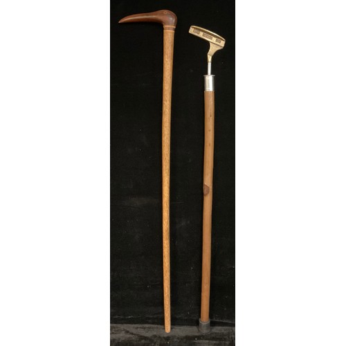 337 - A Pitcairn Island walking cane, the handle carved as the stylised head of a bird; a ‘Sunday stick’ g... 