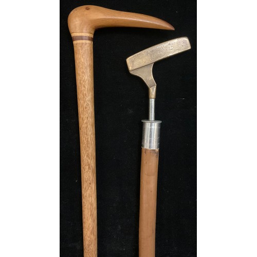 337 - A Pitcairn Island walking cane, the handle carved as the stylised head of a bird; a ‘Sunday stick’ g... 