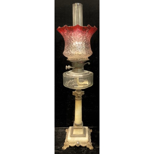 454 - A 19th century oil lamp, brass mounted alabaster column, clear glass reservoir, Duplex twin burner, ... 