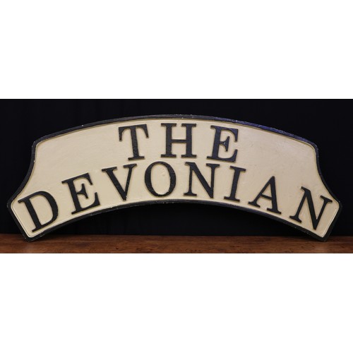 2449 - Railwayana - a post BR cast aluminium headboard, 'THE DEVONIAN', raised lettering on a cream ground,... 