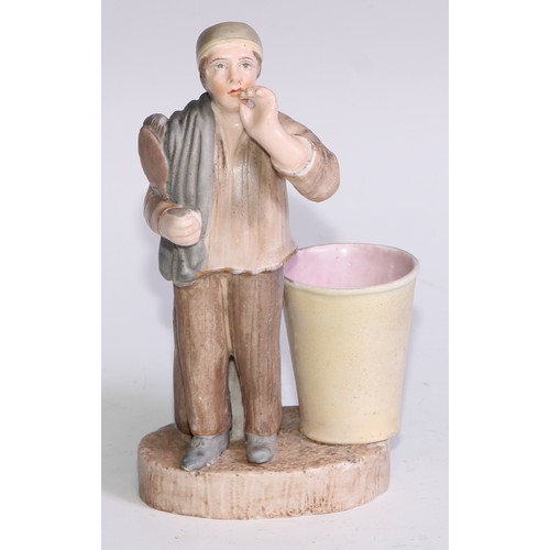 60A - A Sampson Hancock Derby novelty figural spill holder, as a gentleman retiring to bed, 14cm high, blu... 