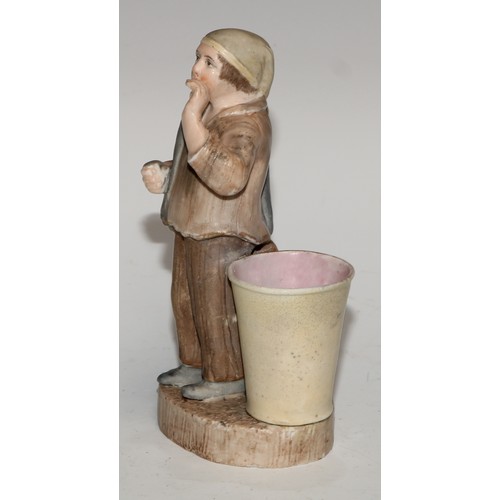 60A - A Sampson Hancock Derby novelty figural spill holder, as a gentleman retiring to bed, 14cm high, blu... 