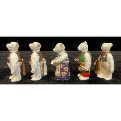 602 - A Royal Crown Derby miniature bear model, Bennetts Shopper Bear, 9cm, certificate; others, Born To S... 