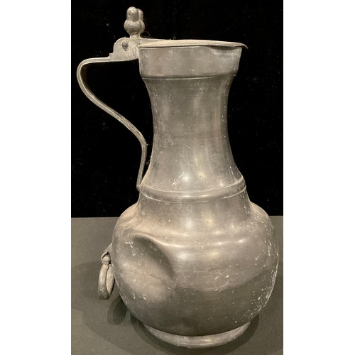 611 - A 19th century French pewter beer jug, the hinged cover with acorn thumbpiece,  34cm, impressed fleu... 