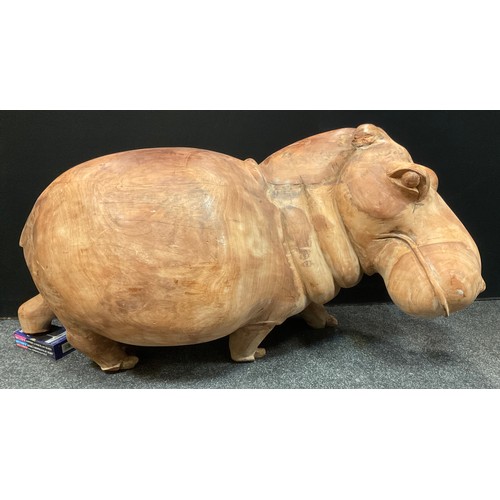 1 - A large African carved hard wood figure, as a Hippopotamus, approx 66cm high, 166cm long, 58cm wide
... 