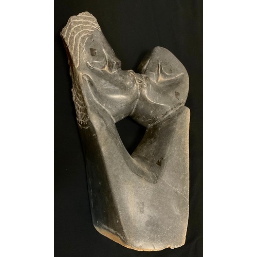 11 - Tribal Art - A carved hardstone figure, the kiss, polished and textured finish, 58cm high