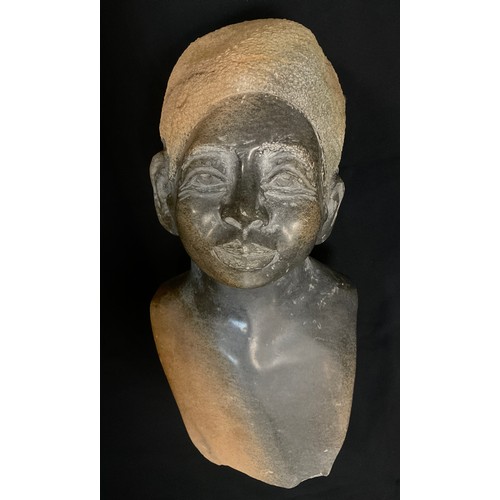 13 - Tribal Art - a carved hardstone bust of an elder, her hair in a head wrap, polished and textured fin... 