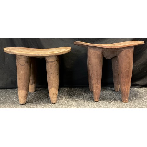 14 - An African Senufo table made from solitary piece of hard wood, dished top, tapering conical legs, 53... 