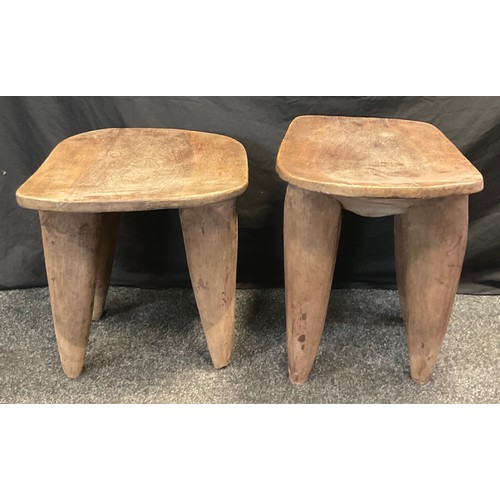 14 - An African Senufo table made from solitary piece of hard wood, dished top, tapering conical legs, 53... 