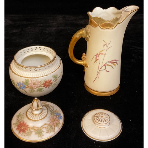 697 - A Royal Worcester Blush Ivory jug, painted with fern leaves, picked out in gilt, scroll handle, curv... 