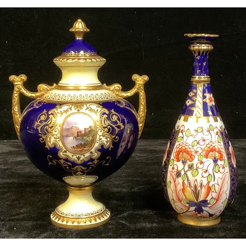 698 - A Coalport ovoid two handled pedestal vase and cover, the pair of oval cartouches painted with Grand... 