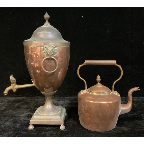 791 - An early 19th century copper urnular samovar with brass tap, pair of ram mask loop handles, domed co... 