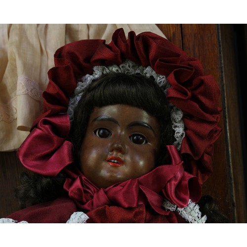 2255 - An Armand & Marseille (Germany) bisque head and ball jointed painted composition black doll, sleepin... 