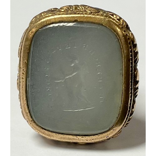 858 - A 19th century seal fob, with intaglio cherub and inscription seal