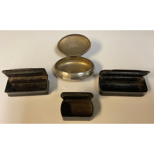 869 - Two Victorian horn snuffs; an oval plated snuff; a papier-mâché snuff (4)