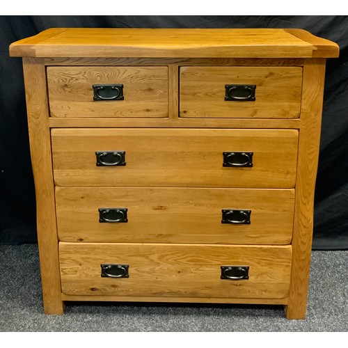 101 - A contemporary oak chest of drawers, two short over three long drawers, 97cm high x 98cm wide x 42.5... 